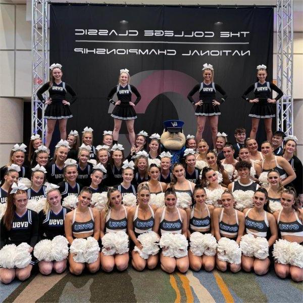 The GVSU Dance and Cheer teams posing for a picture after winning national championships at the College Classic.